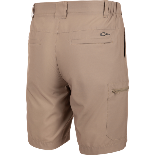 Backside of Traveler Trek Short with built-in stretch, moisture-wicking fabric, YKK zippered pockets, and 8.5 inseam. Ideal for adventures.