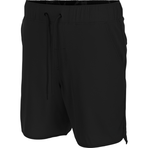 Commando Lined Volley Short 7in with elastic waistband, adjustable drawstring, scalloped hem, two front slash pockets, and back zippered pockets, showcasing versatile design and quick-dry features.
