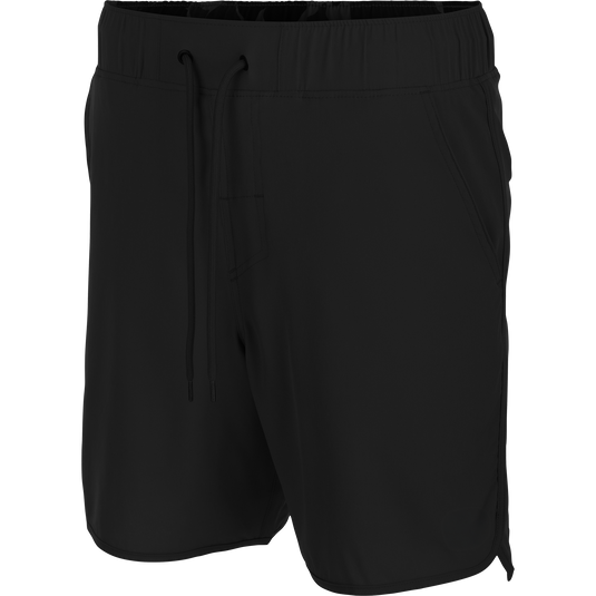Commando Lined Volley Short 7in with elastic waistband, adjustable drawstring, scalloped hem, two front slash pockets, and back zippered pockets, showcasing versatile design and quick-dry features.