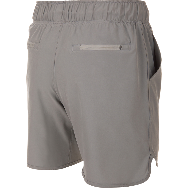Drake Commando Lined Volley Short 7in features a quick-dry liner, elastic waistband, and zippered pockets, ideal for versatile outdoor activities.