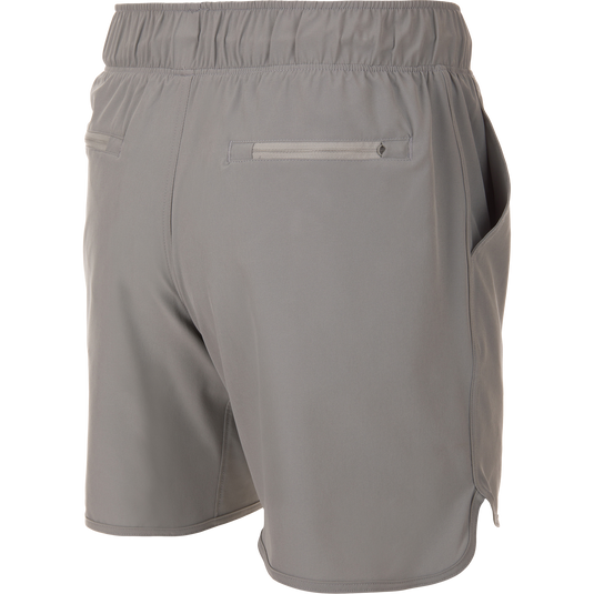 Drake Commando Lined Volley Short 7in features a quick-dry liner, elastic waistband, and zippered pockets, ideal for versatile outdoor activities.