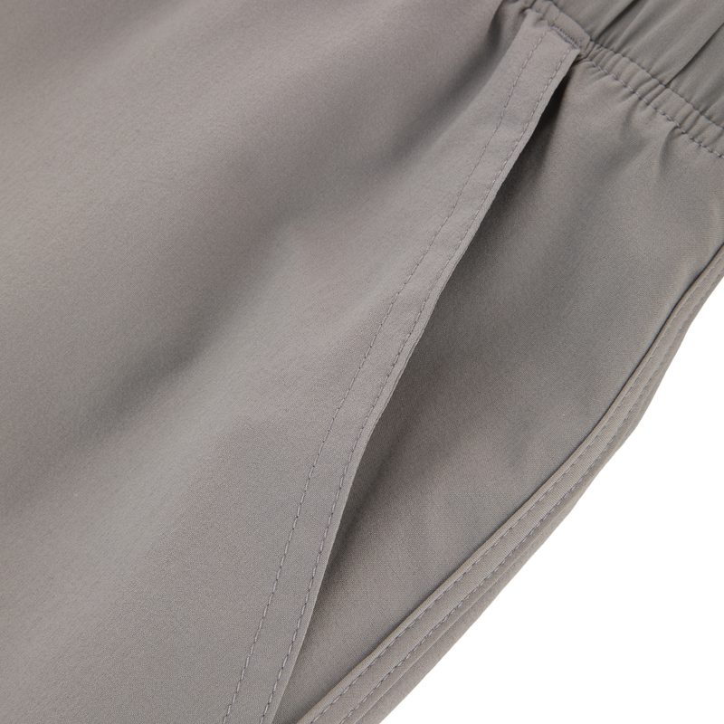 Commando Lined Volley Short 7in with built-in liner, elastic waistband, and pockets, designed for versatility and quick drying, ideal for active and casual wear.