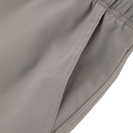 Commando Lined Volley Short 7in with built-in liner, elastic waistband, and pockets, designed for versatility and quick drying, ideal for active and casual wear.