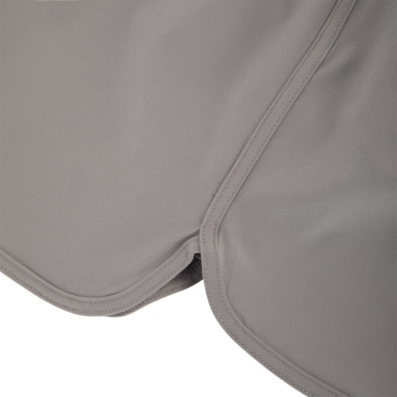 Commando Lined Volley Short 7in with elastic waistband, drawstring, scalloped hem, front slash pockets, and hidden zippered back pockets, ideal for versatile outdoor activities.