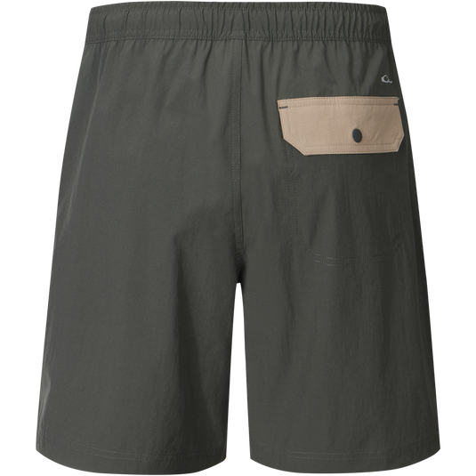 Spring Brake Short featuring an elastic waistband, zippered pocket, and lightweight fabric with stretch, designed for versatile comfort and performance in various activities.