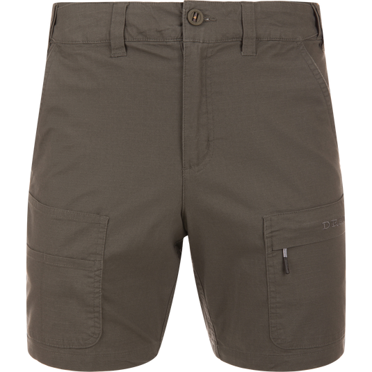 9 Pocket Ripstop Short featuring lightweight ripstop material, seven belt loops, two large thigh cargo pockets, zippered compartment, and reinforced plier’s pocket, ideal for outdoor adventures.