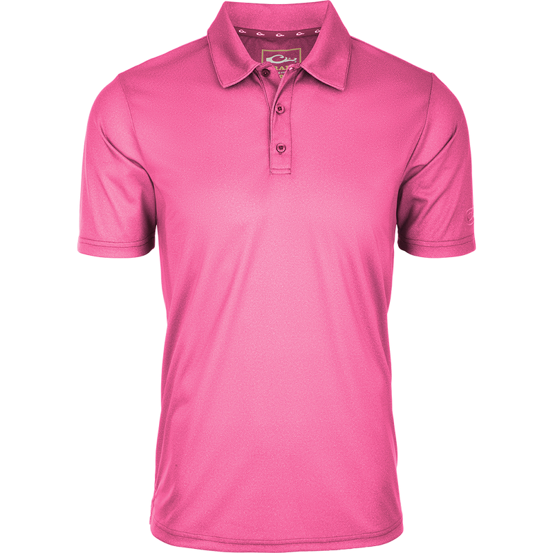 Performance Heather Polo S/S with a three-button placket, textured weave, and split tail hem, designed for comfort and mobility with moisture-wicking polyester.