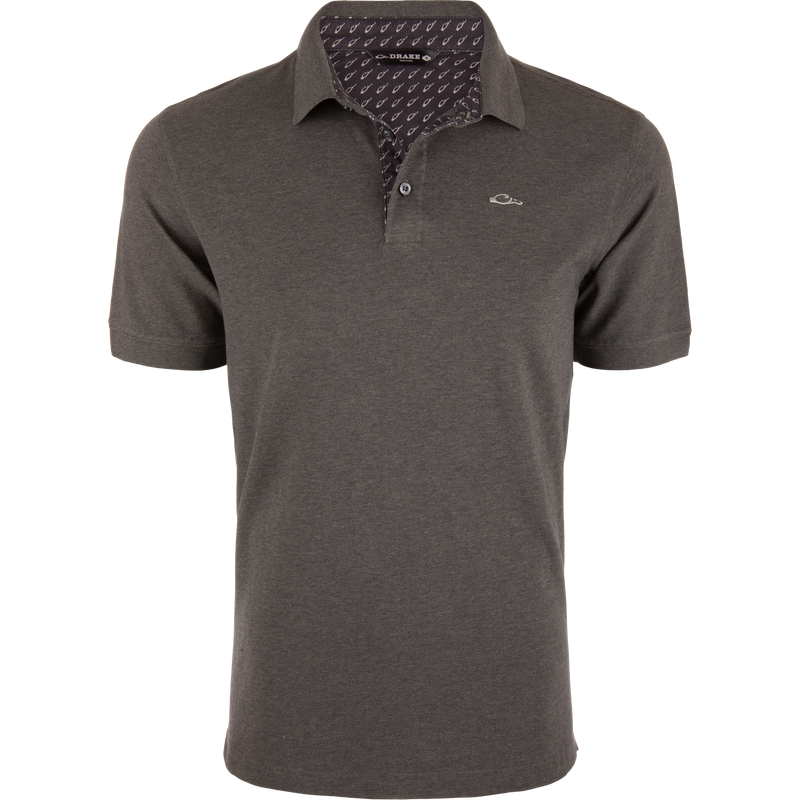 Grey Drake Pique Logo Polo featuring a three-button placket, rib knit collar, and embroidered duck head logo on the chest, showcasing classic and modern styling.