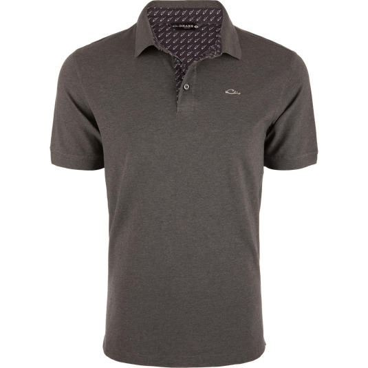 Grey Drake Pique Logo Polo featuring a three-button placket, rib knit collar, and embroidered duck head logo on the chest, showcasing classic and modern styling.