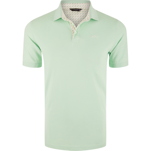 Pique Logo Polo featuring a white collar, three-button placket, rib knit cuffs, and embroidered Drake duck logo on chest, showcasing classic style with modern stretch.
