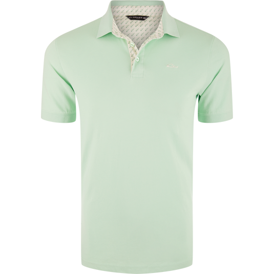 Pique Logo Polo featuring a white collar, three-button placket, rib knit cuffs, and embroidered Drake duck logo on chest, showcasing classic style with modern stretch.