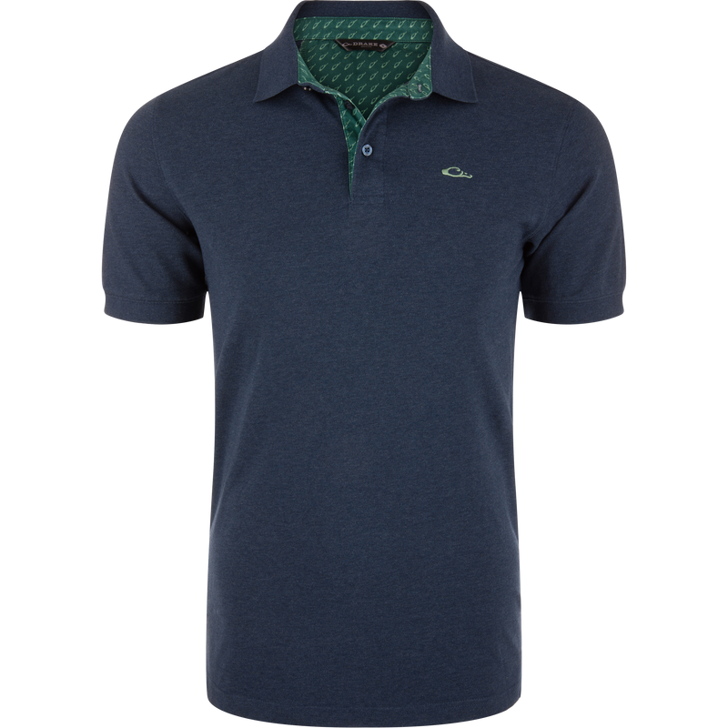 Pique Logo Polo featuring a green collar, three-button placket, rib knit collar and cuffs, and embroidered Drake duck head logo, highlighting modern performance and classic style.