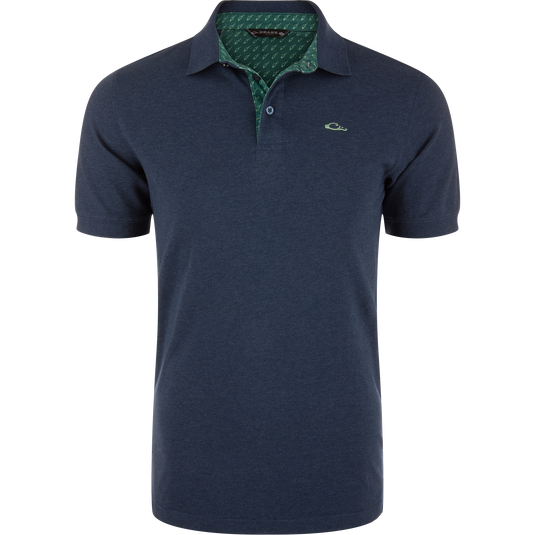 Pique Logo Polo featuring a green collar, three-button placket, rib knit collar and cuffs, and embroidered Drake duck head logo, highlighting modern performance and classic style.