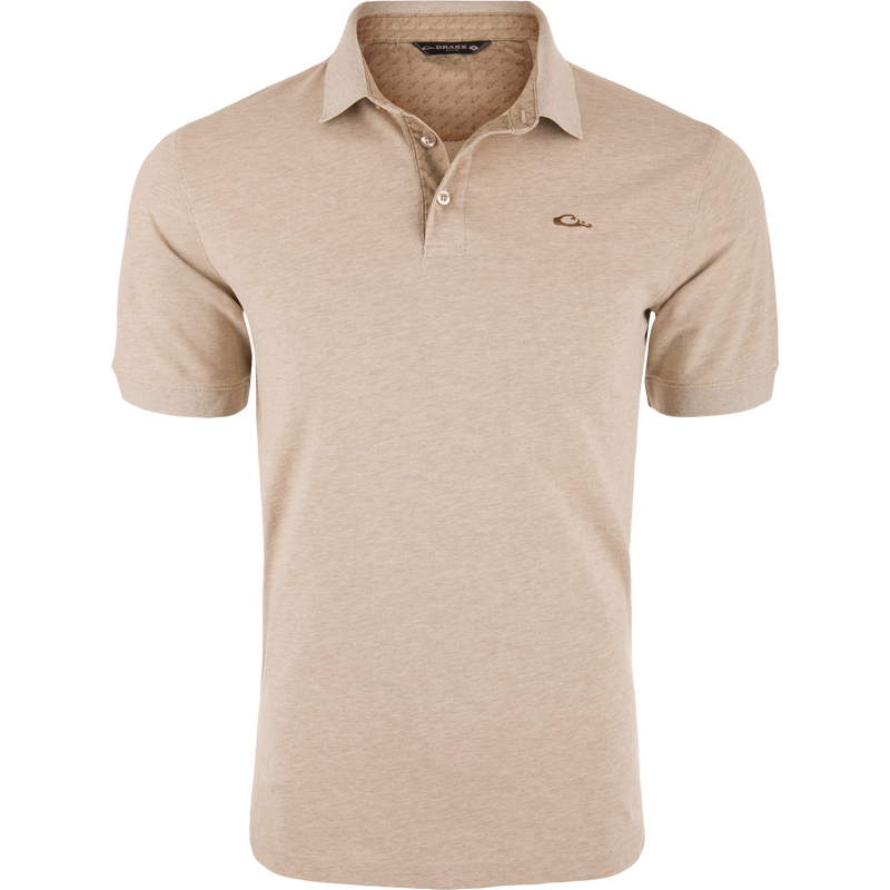 Pique Logo Polo featuring a classic design with a three-button placket, rib knit collar, and embroidered chest logo, showcasing modern stretch and performance enhancements.