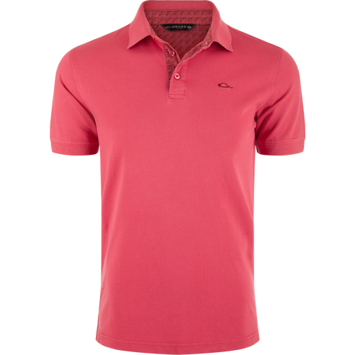 Pique Logo Polo features a classic three-button placket with ribbed collar and cuffs, embroidered Drake duck logo on chest, emphasizing modern performance and timeless style.
