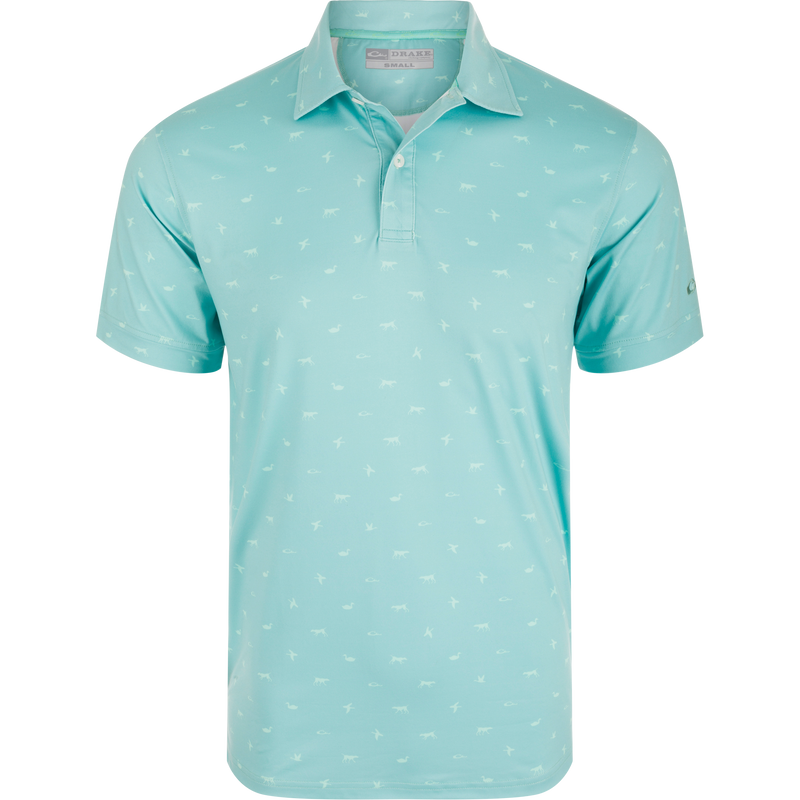 Men’s short-sleeve Performance Print Polo Shirt with a fold-over collar, featuring a Drake, Duck, Dog print, two-button placket, and open sleeve cuffs.