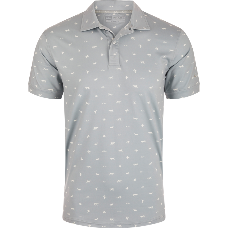 Performance Print Polo Shirt featuring white bird patterns, a three-button placket with faux mother of pearl buttons, self-fabric collar, open cuffs, and split tail hem.