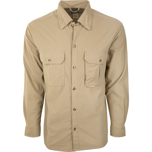 A soft, warm, and breathable Three Pocket Micro-Fleece Shirt for active outdoorsmen. Features two chest pockets with button flap closure and a hidden vertical Magnattach™ pocket.
