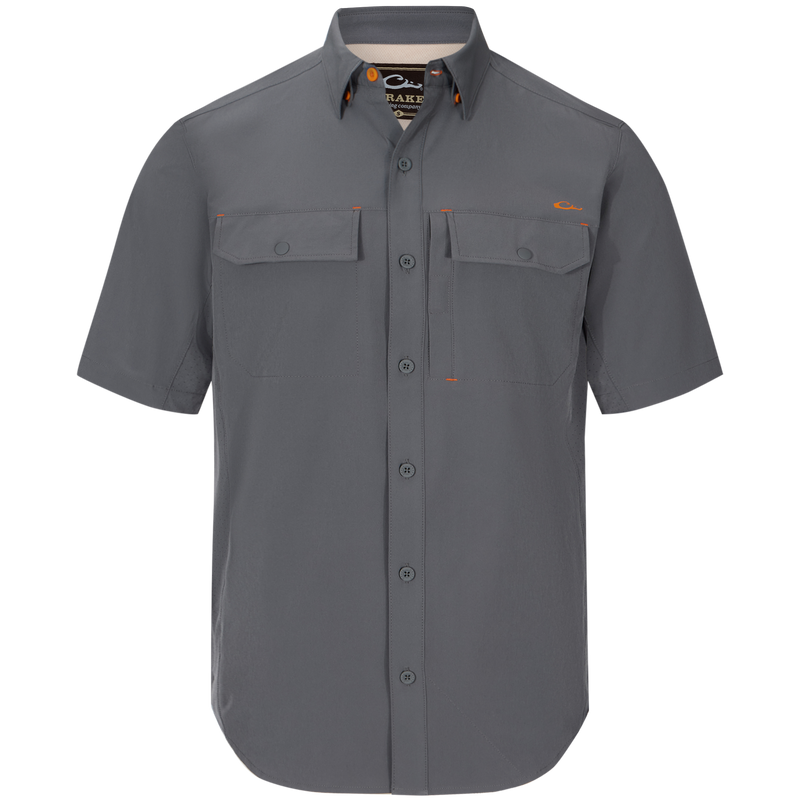 Lake Shore Performance Short Sleeve Shirt featuring a hidden button-down collar, two flap chest pockets, and a vented cape back, designed for versatile outdoor activities.