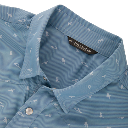 Drake Cinco Ranch Western Short Sleeve Shirt with subtle stripe texture, white animal motifs, faux pearl snaps, and vented back cape.