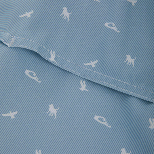 Close-up of the Cinco Ranch Western Short Sleeve Shirt showcasing light-blue striped fabric with white animal silhouettes and a visible seam, highlighting its intricate design.