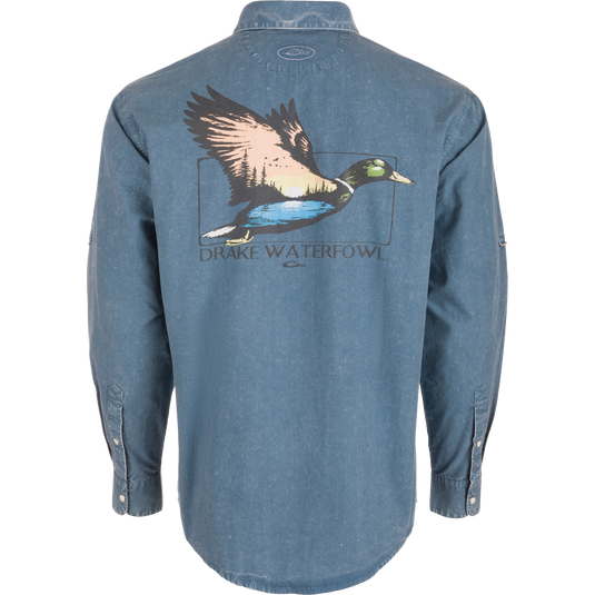 Back view of the Cinco Ranch Cotton Acid Wash Graphic Shirt featuring a flying duck graphic with sunset, treeline, water, and Purewhitelaneshop text.