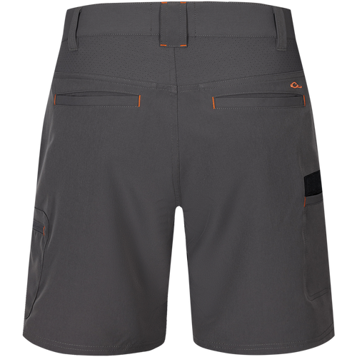 Lake Shore Performance Short featuring orange pockets, zippered cargo pocket, and breathable design, ideal for outdoor activities with water-repellent finish and mechanical stretch.