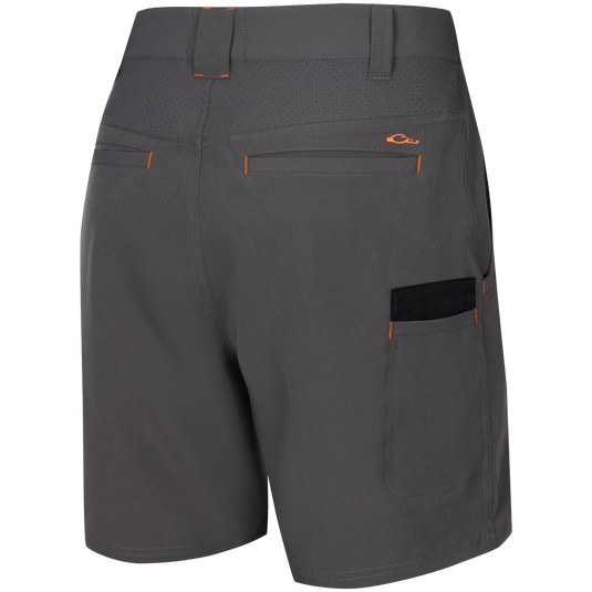 Lake Shore Performance Short featuring water-repellent fabric, laser-punched yoke, zippered cargo pocket, and reinforced plier’s pocket, ideal for active outdoor pursuits.