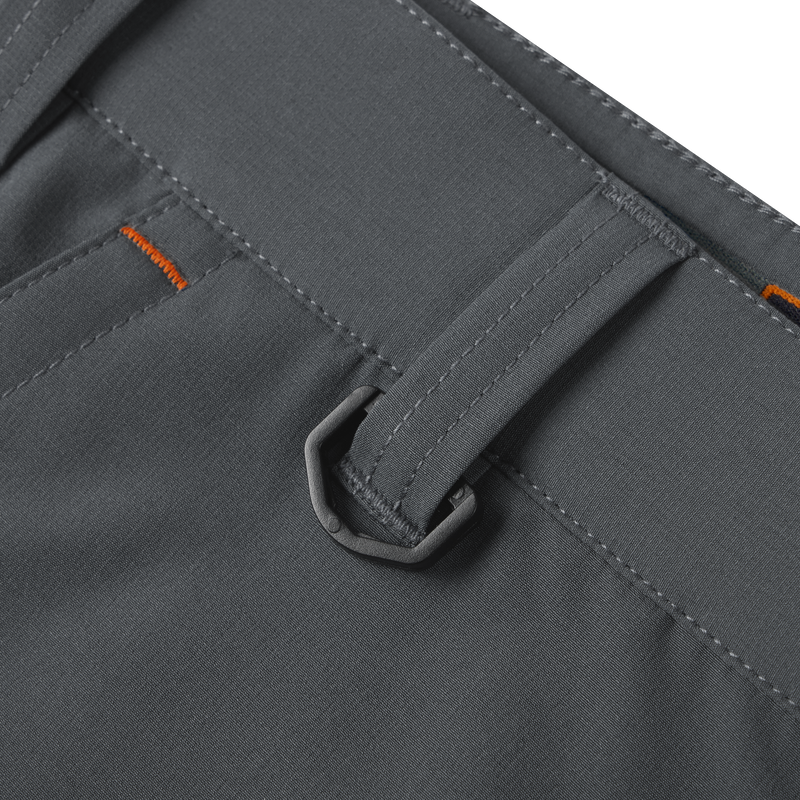 Close-up of Lake Shore Performance Short featuring zippered left cargo pocket and reinforced right plier’s pocket, designed for versatile outdoor activities with technical features.