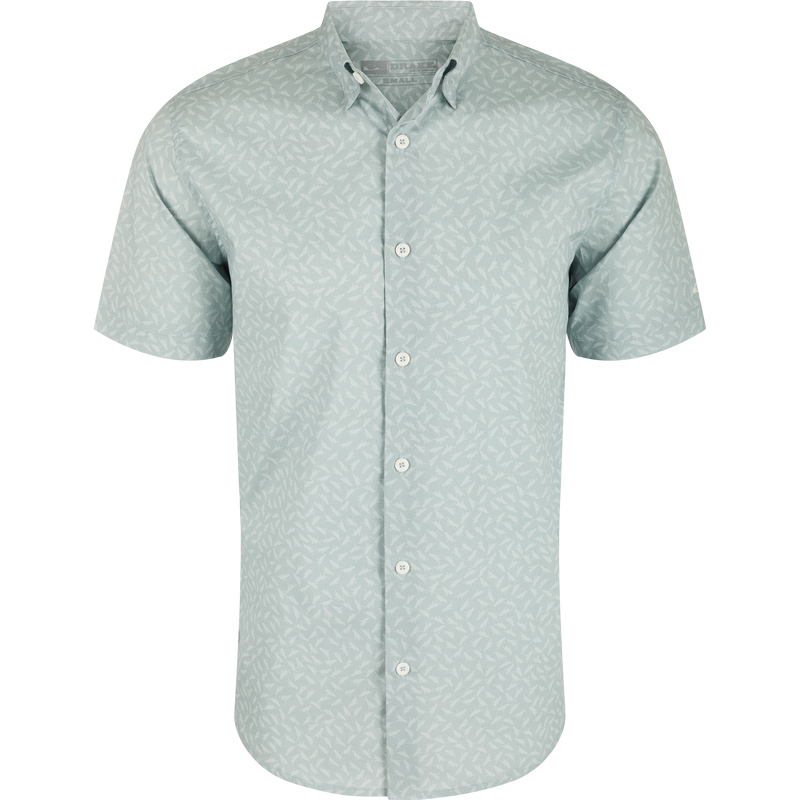 Close-up of the Cotton Lab Print Short Sleeve Shirt featuring a hidden button-down collar, sculpted hem, and soft cotton blend fabric with built-in stretch.