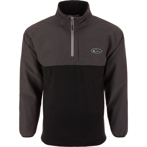 Eqwader Half Zip Pullover with waterproof upper shell, breathable black fleece body, and chest zip pocket, designed for enhanced comfort and protection in waterfowl hunting.