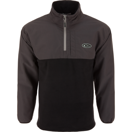Eqwader Half Zip Pullover with waterproof upper shell, breathable black fleece body, and chest zip pocket, designed for enhanced comfort and protection in waterfowl hunting.
