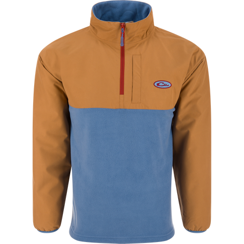 Eqwader Half Zip Pullover featuring a tan, waterproof upper and light blue, breathable fleece lower, with a red zipper and chest pocket, ideal for waterfowl hunting.