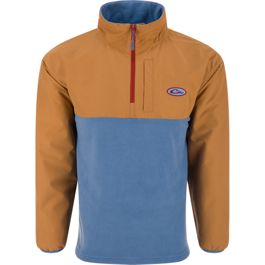 Eqwader Half Zip Pullover featuring a tan, waterproof upper and light blue, breathable fleece lower, with a red zipper and chest pocket, ideal for waterfowl hunting.