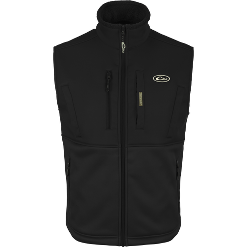 Hole Shot Solid Vest with zippered pockets, windproof upper body, and sherpa-lined lower body for warmth, featuring adjustable drawcord waist and high handwarmer pockets.