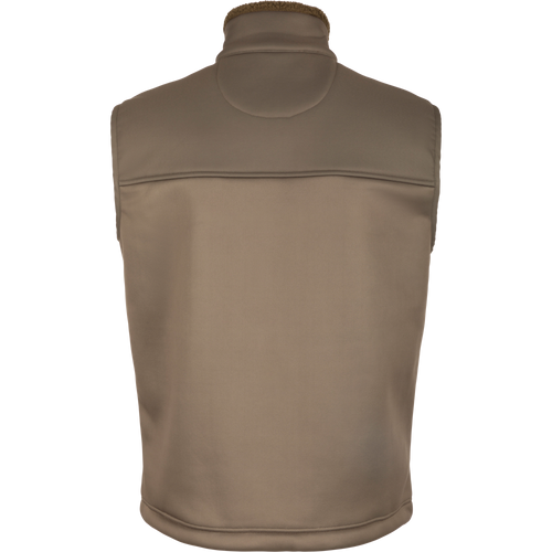 Close-up of the Hole Shot Solid Vest, showcasing its windproof design, sherpa lining, high handwarmer pockets, and adjustable drawcord waist.