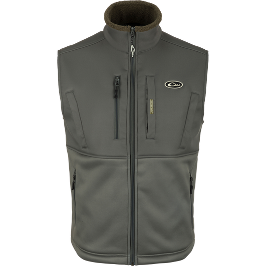 Hole Shot Solid Vest with zippers, windproof upper body, sherpa-lined lower body, handwarmer pockets, and adjustable waist. Perfect for cold weather protection and comfort.