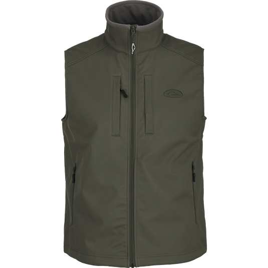 A Windproof Soft Shell Vest with multiple pockets for essential storage. Made from 100% polyester with bonded grid fleece lining. Windproof, water resistant, and adjustable for a comfortable fit.