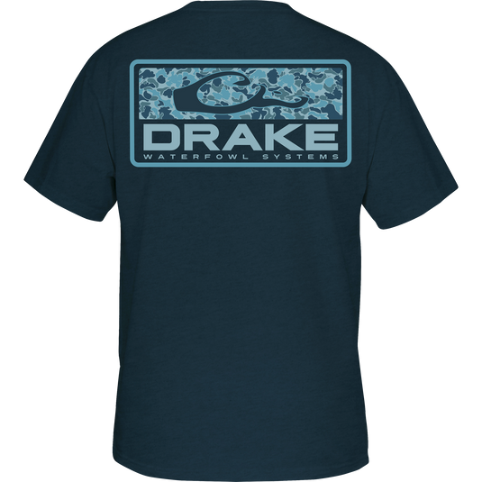 Back of the Old School Bar T-Shirt featuring a blue camo logo panel with “DRAKE” and “WATERFOWL SYSTEMS”; front chest pocket includes Drake logo.