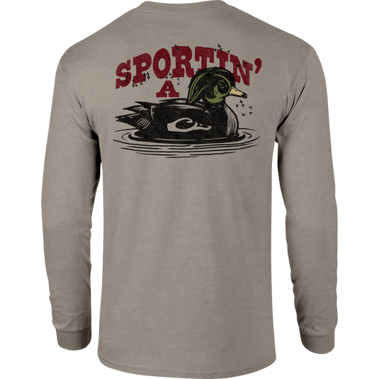 Sportin A Woodie Long Sleeve T-Shirt featuring front pocket Drake logo and back graphic, crafted from a soft 60% cotton, 40% polyester blend.