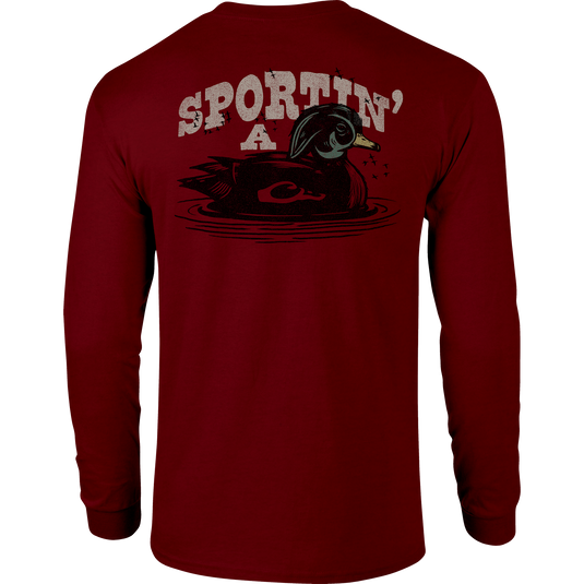 Sportin A Woodie Long Sleeve T-Shirt with front pocket Drake logo and back graphic, crafted from a soft cotton-polyester blend for comfort.