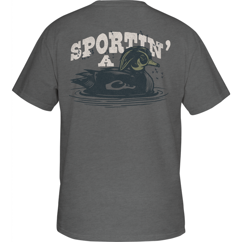 Sportin A Woodie T-Shirt featuring the Drake logo on the front pocket and a Sportin a Woodie graphic on the back, made from a soft cotton-polyester blend.