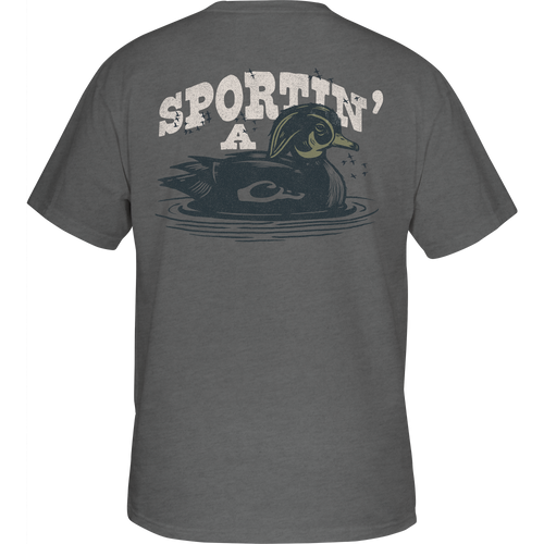 Sportin A Woodie T-Shirt featuring the Drake logo on the front pocket and a Sportin a Woodie graphic on the back, made from a soft cotton-polyester blend.