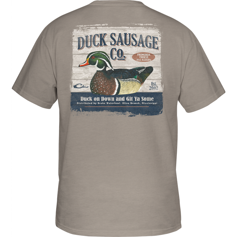 Duck Sausage T-Shirt features a Drake logo on the front pocket and a Duck Sausage Co. graphic on the back, made from soft cotton-polyester blend.