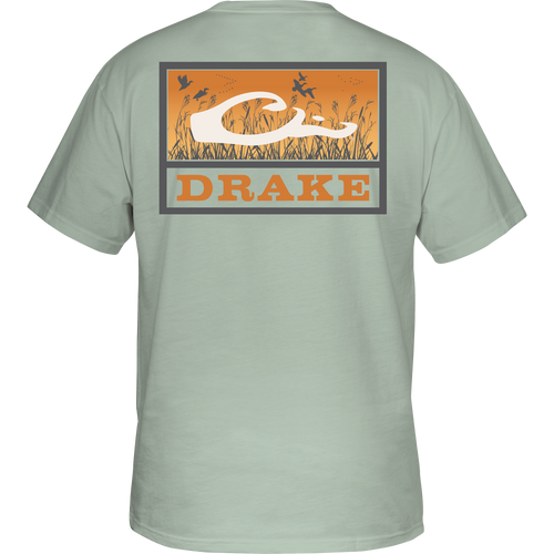 Marsh Flight T-Shirt featuring birds over a field, Drake logo on the back, crafted from soft, garment-washed 100% cotton for comfort.