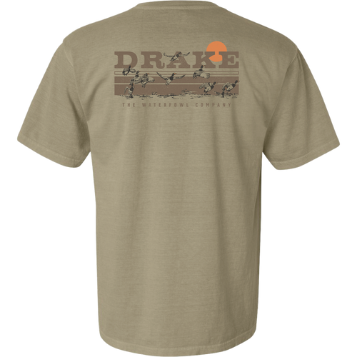 Back of the Take Flight T-Shirt featuring the Purewhitelaneshop logo, orange sun, and ducks in flight across a marsh, highlighting outdoor hunting themes.