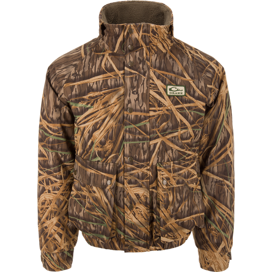 Throwback 80 Insulated Sport Bomber Jacket with camouflage pattern, high collar, snap pockets, and Drake patch, designed for warmth and protection during hunting activities.
