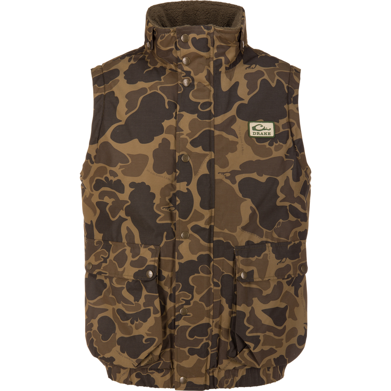 Throwback 80 Sport Vest in camouflage with high collar, snap-front, and two flap pockets; ideal for outdoor enthusiasts requiring warmth and weather protection.