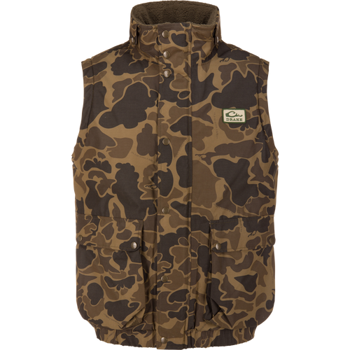 Throwback 80 Sport Vest in camouflage with high collar, snap-front, and two flap pockets; ideal for outdoor enthusiasts requiring warmth and weather protection.