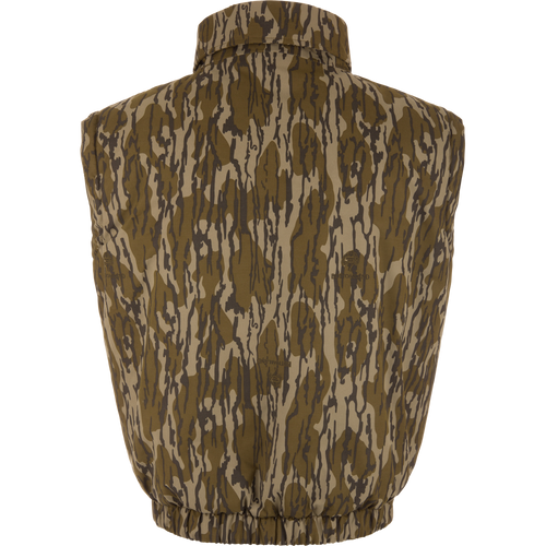 Throwback 80 Sport Vest from Purewhitelaneshop, featuring a camouflage pattern, stand-up collar, elastic waistband, and large accessory pockets, ideal for outdoor adventures.